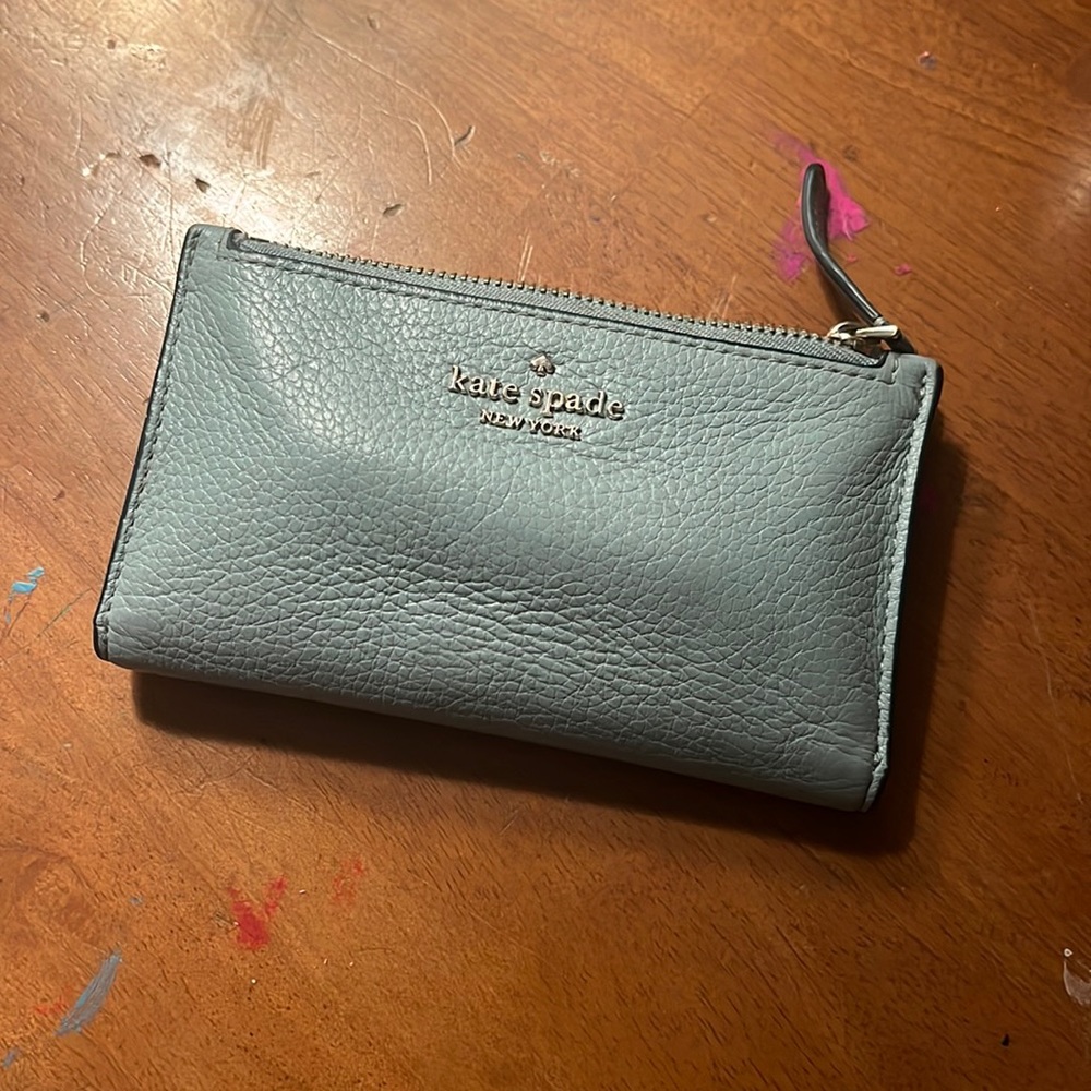 Kate spade hand wallet. Some small stains but in good condition.